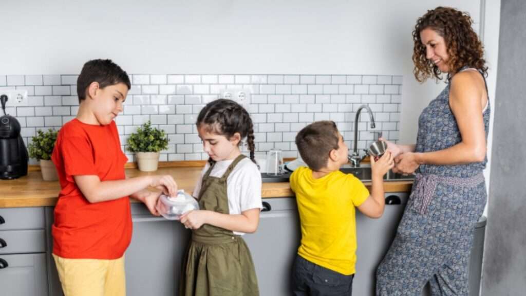 family chores with kids helping in the kitchen